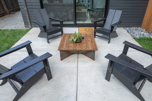 concrete patio with chairs
